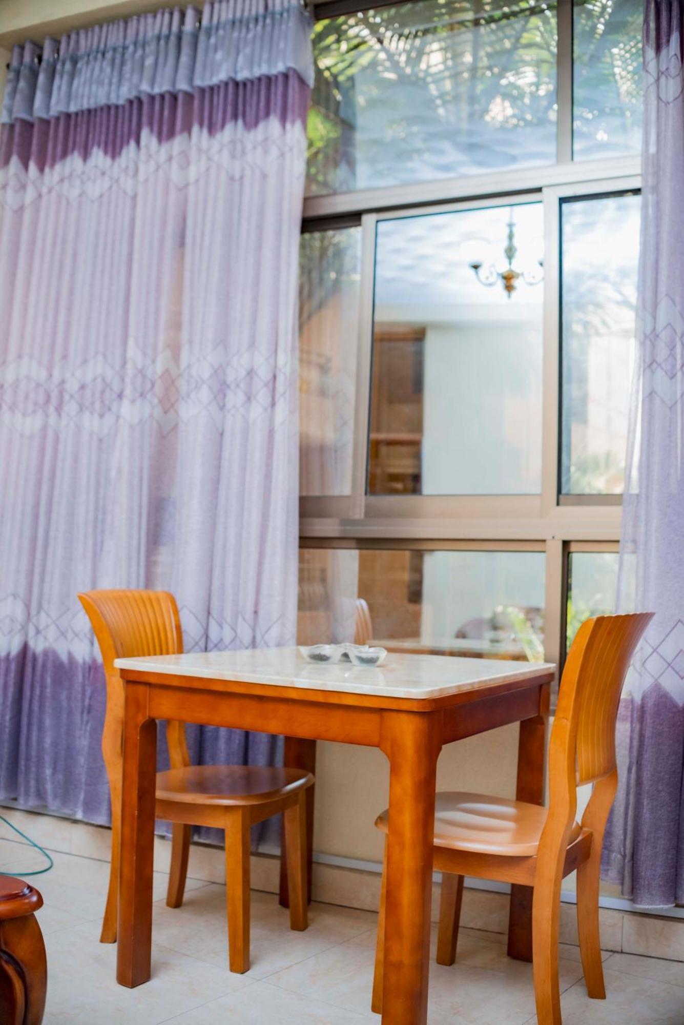 Tigers'S Apartment Hotel Бужумбура Екстериор снимка