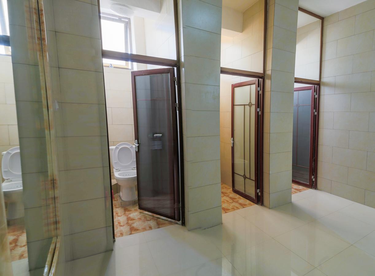 Tigers'S Apartment Hotel Бужумбура Екстериор снимка
